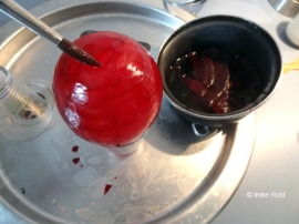 Boiled beetroot peels create a lovely red colour, which I painted onto the frozen ice/egg