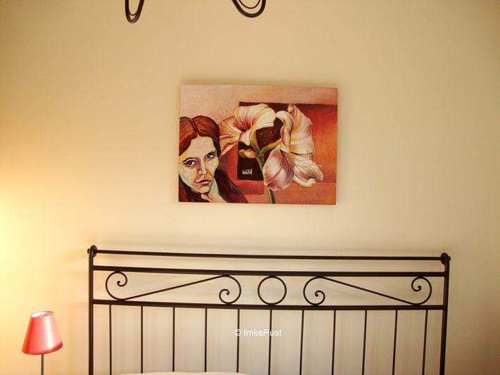 View of the room with the altered artwork