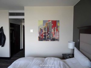 Hotel room and digital canvas print as found