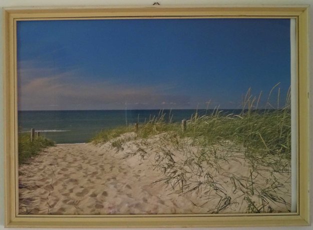 Cheap calendar print of beach scene in our holiday appartment