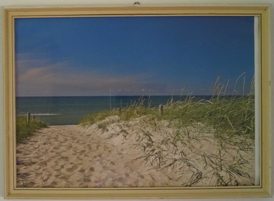 Cheap calendar print of beach scene in our holiday appartment