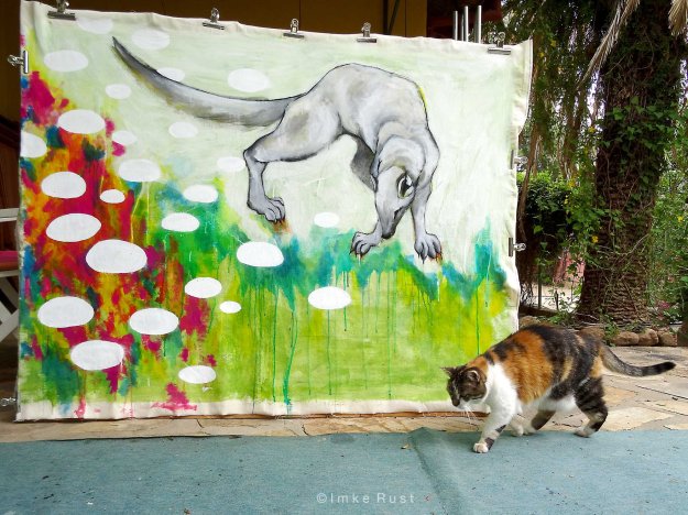 Clarissa, my cat, inspecting the last painting I have done in 2015 - an impression of a wild mongoose who visits us daily.