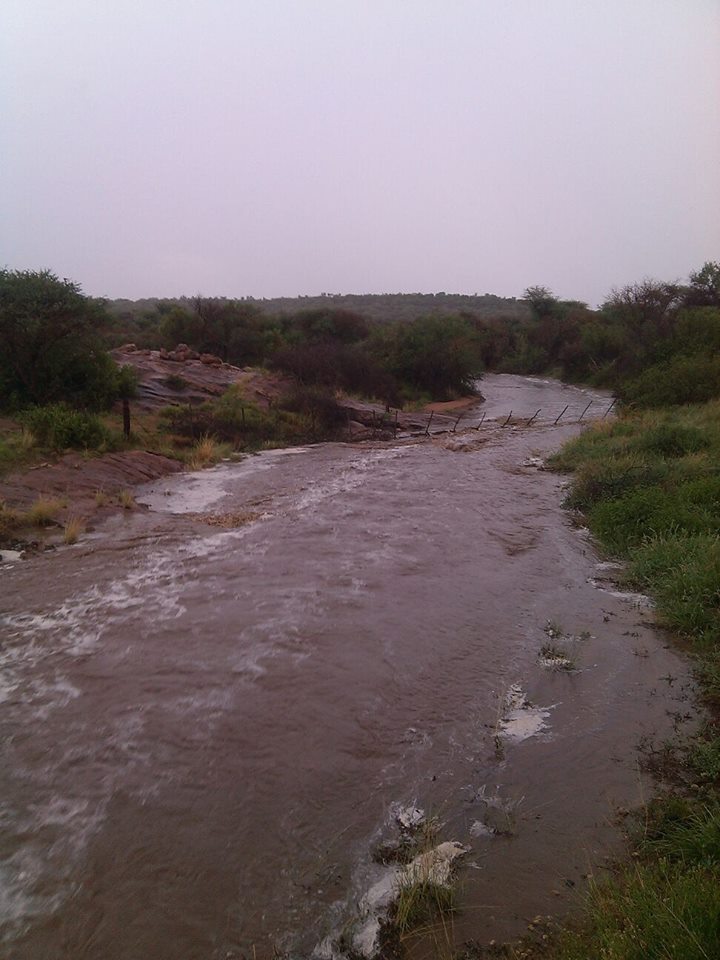 Rain on the farm and flowing rivers - Photo kindly supplied by Amanda Koekemoer